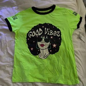 Neon “Good Vibes” green short sleeved tee.